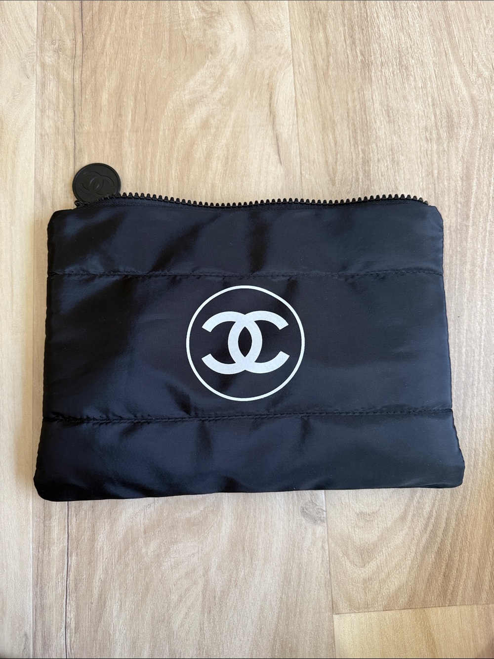 Black Nylon Logo Toiletry Pouch with top zip closure.